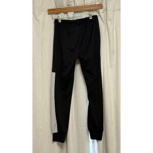Nike Jordan Youth Track Pants in Black with White Stripe